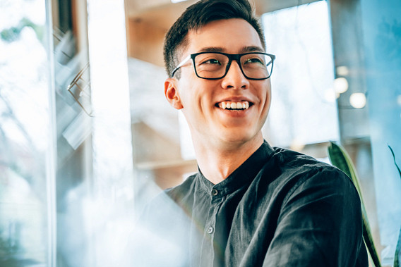 smiling man in office